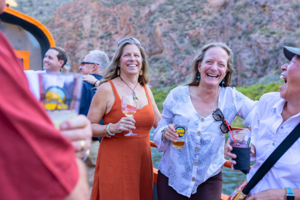 News Coverage Blog images. (18) Women laughing on open air car